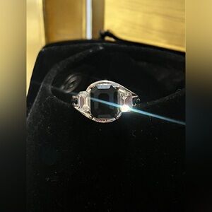 Elegant Cushion-Cut Black Gemstone Ring with Intricate Band Detailing